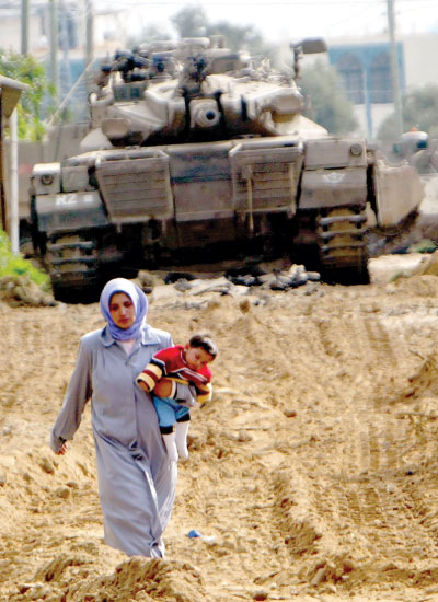 اجمل ما قيل في المرأة الفلسطينية،،، تحية لكل فلسطينية Aug06_wars2